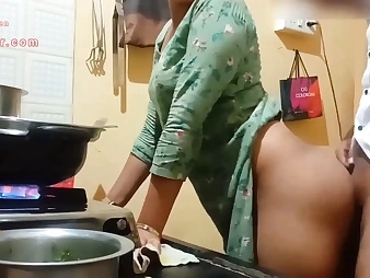Watch this Indian COUGAR with a ample booty get down and grubby in the kitchen